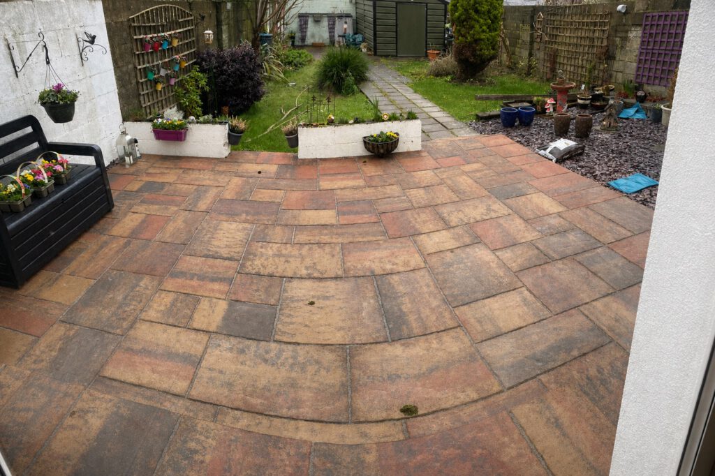 After β the garden level raised with an Indian sandstone patio for safe, level access